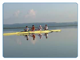 Dutch National Crew rowing on the mirror flat lake of Soustons